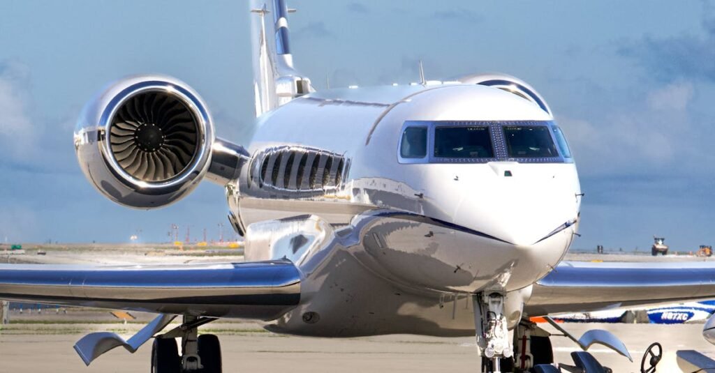 A sleek private jet being prepared for takeoff at the airport runway for the Super Bowl