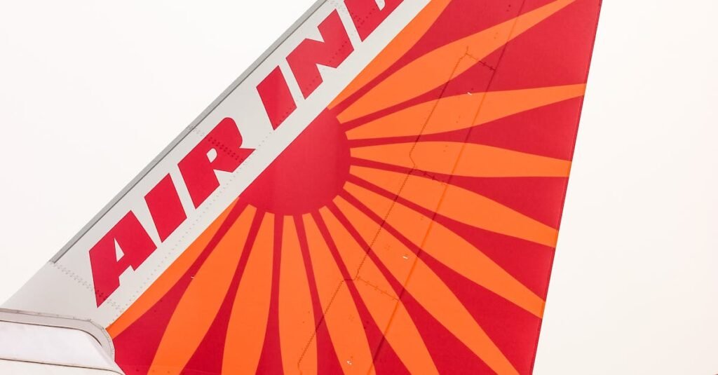 pexels-photo-30002014-30002014-1 Close-up of Air India's aircraft tail fin featuring the iconic red and orange design.