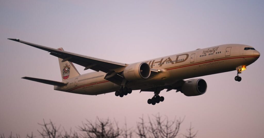 Etihad Airways Boeing 777-300ER gracefully landing at sunrise in Geneva, Switzerland.