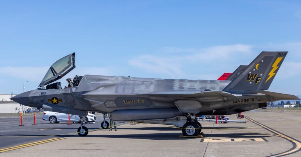 F-35 fighter jet of the US Marine Corps on a sunny day at an airfield.