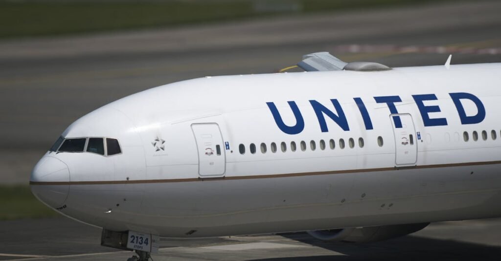 Close-up of a United Airlines airplane on taxiway, emphasizing the aircraft's details.