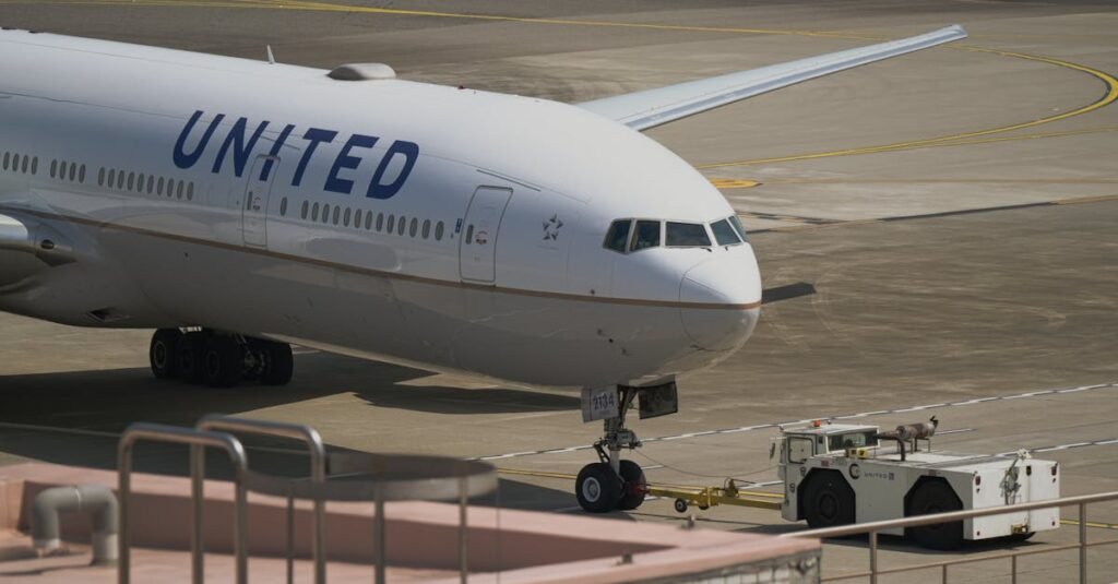 pexels-photo-31847555-31847555 United Airlines aircraft being towed on the runway at Taoyuan City Airport, Taiwan.