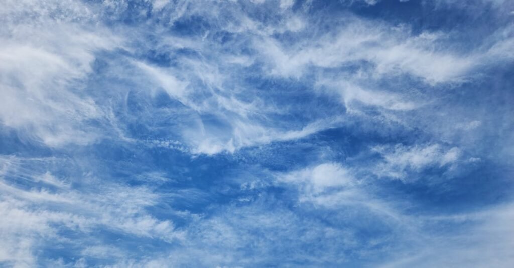 pexels-photo-35601838-35601838 Beautiful natural scene of a blue sky filled with wispy white clouds, perfect for background or nature-themed projects.