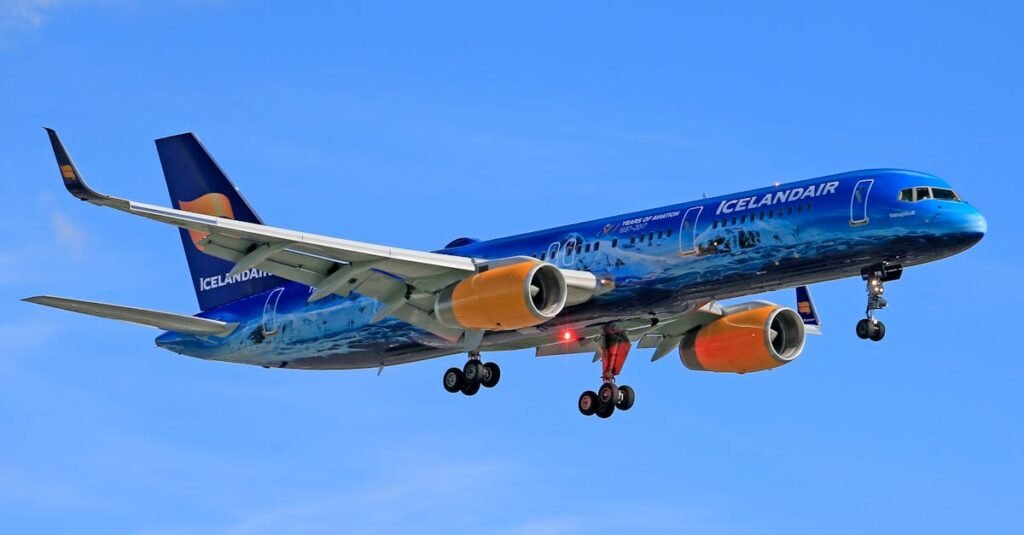 Icelandair Controversy in flight against blue sky, showcasing vivid colors and design.