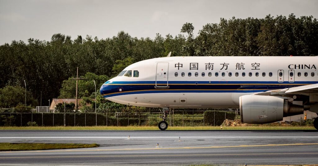China Southern Airlines Airbus A350 airplane on runway with green backdrop.